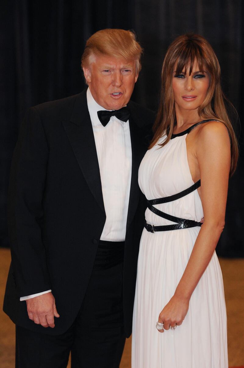 epa02711366 US business magnate Donald Trump (L) and his wife, Slovenian model Melania Trump (R), arrive for the White House Correspondents' Association (WHCA) Dinner in Washington DC, USA, 30 April 2011. The event is being attended by celebrity guests, US President Barack Obama and the First Lady and members of the Obama administration.  EPA/MICHAEL REYNOLDS