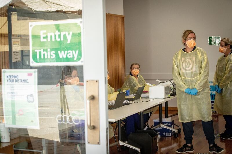 Medical professionals are seen at Kilmore Soldiers Memorial Hall in Kilmore, Australia. A pop-up Covid-19 testing site has been set up in Kilmore following a cluster outbreak in the regional Victorian town. Victoria has recorded 14 new cases of COVID-19 and 0 deaths overnight. Getty Images