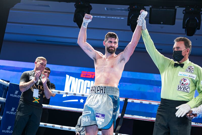 Rocky Fielding has his hands raised following his victory over Emmanuel Danso.