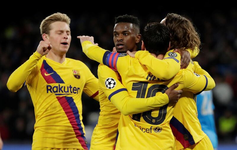 Barcelona's Antoine Griezmann celebrates scoring their equaliser against Napoli with Lionel Messi, Frenkie de Jong and teammates. Reuters