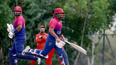 Muhammad Waseem and Alishan Sharafu (R) of UAE in the ACC Men's Premier Cup 2024 Group B match between the United Arab Emirates (UAE) and Bahrain in Oman Cricket Stadium in Al Amerat, Muscat, Oman on 13th April 2024. Photo By: Subas Humagain for The National