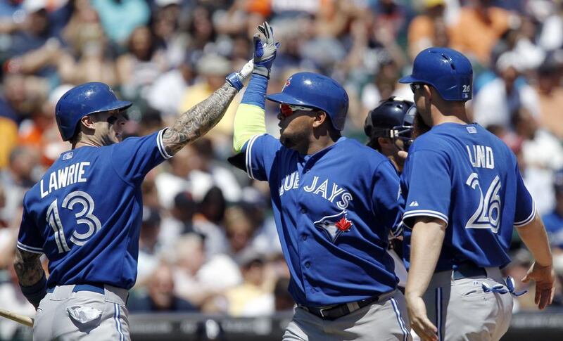 Juan Francisco, centre, has already belted 10 home runs for the Toronto Blue Jays this season. Duane Burleson / AFP

