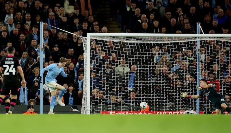 City's Cole Palmer scores their fifth goal. Reuters