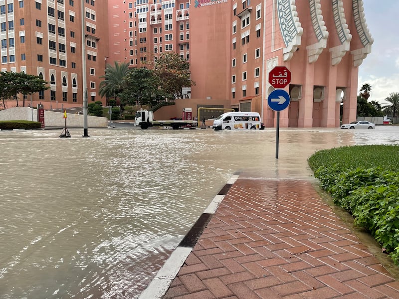 Flooding is seen at the Garden cross roads intersection next to Ibn Battuta mall. James O'Hara / The National