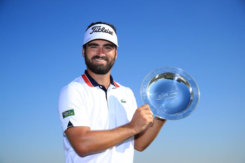 Antoine Rozner of France poses with the trophy after winning the Golf in Dubai Championship at Jumeirah Golf Estates on Saturday. Getty