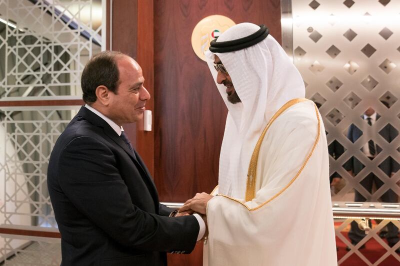 ABU DHABI, UNITED ARAB EMIRATES - September 25, 2017: HH Sheikh Mohamed bin Zayed Al Nahyan, Crown Prince of Abu Dhabi and Deputy Supreme Commander of the UAE Armed Forces (R), receives HE Abdel Fattah El Sisi, President of Egypt (L), at the Presidential Airport.

( Hamad Al Kaabi / Crown Prince Court - Abu Dhabi )