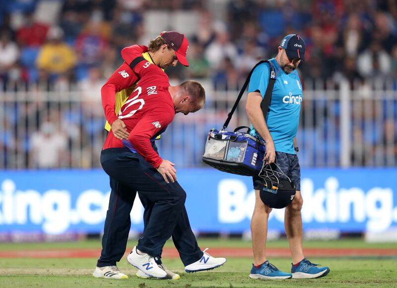 England's Jason Roy goes off injured at the Sharjah Cricket Stadium.