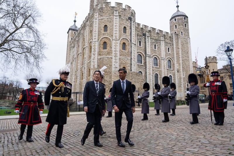 Mr Sunak and Japan's Prime Minister Fumio Kishida arrive at the Tower of London for a meeting. Getty Images