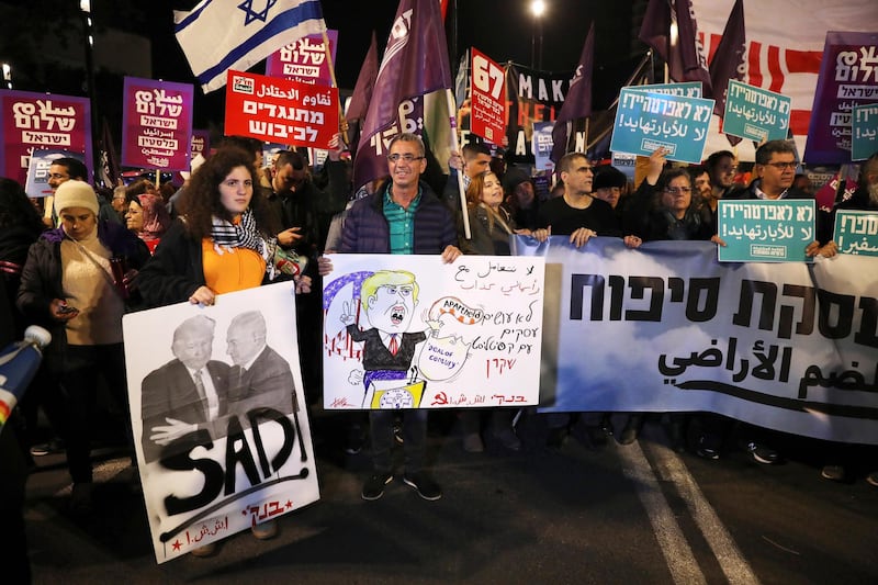 Israelis and Israeli Arabs protest against US President Trump's peace plan as they march in Tel Aviv , Israel.  EPA