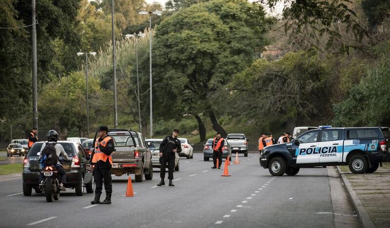A police checkpoint is seen at the Circunvalacion Avenue in Rosario, Santa Fe, Argentina where football star Lionel Messi and Antonella Roccuzzo will celebrate their wedding on June 30. Marcelo Manera / AFP
