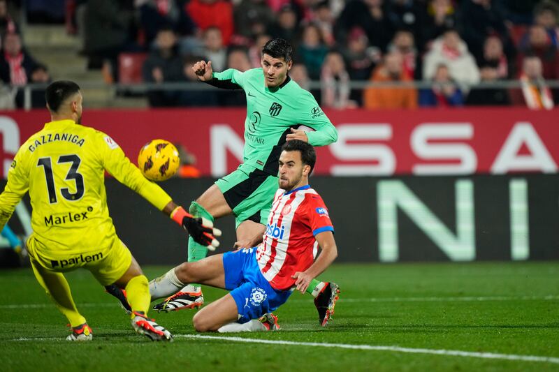 Atletico Madrid striker Alvaro Morata scores his third goal against Girona. EPA 