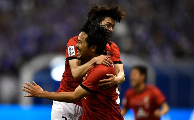 Shinzo Koroki celebrates after scoring Urawa's equalising goal against Hilal. EPA