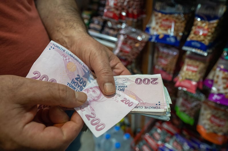 Turkish banknotes. The country's currency fell to a near two-month low during trade on Monday. Bloomberg