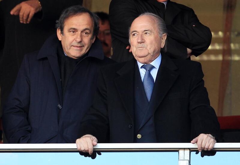 Michel Platini, left, is widely expected to stand for election to post of Fifa presidency against Sepp Blatter. David Cannon / Getty Images