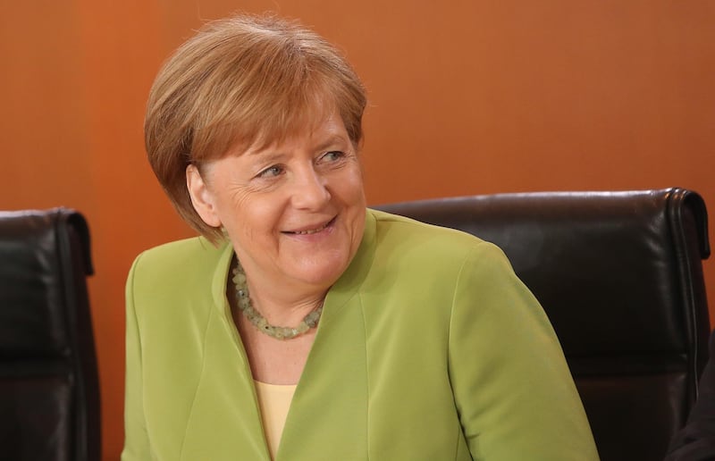 BERLIN, GERMANY - JUNE 20:  German Federal Chancellor Angela Merkel (CDU) arrives for the weekly German federal Cabinet meeting on June 20, 2018 in Berlin, Germany. High on the meeting's agenda was discussion of a report on the country's weapons exports for the previous year as well as policies pertaining to refugees' entry into the country.  (Photo by Adam Berry/Getty Images)