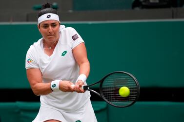 Tunisia's Ons Jabeur plays a return to Venus Williams of the US during the women's singles second round match on day three of the Wimbledon Tennis Championships in London, Wednesday June 30, 2021.  (AP Photo / Alberto Pezzali)