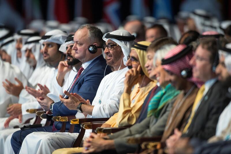 DUBAI, UNITED ARAB EMIRATES - February 11, 2018: HH Sheikh Mohamed bin Rashid Al Maktoum, Vice-President, Prime Minister of the UAE, Ruler of Dubai and Minister of Defence (center R), HH Sheikh Mohamed bin Zayed Al Nahyan Crown Prince of Abu Dhabi Deputy Supreme Commander of the UAE Armed Forces (C), and HE Igor Dodon, President of Moldova (center L), listen to the a speech by HE Narendra Modi Prime Minister of India (not shown), during the World Government Summit. 
( Ryan Carter / Crown Prince Court - Abu Dhabi )
---