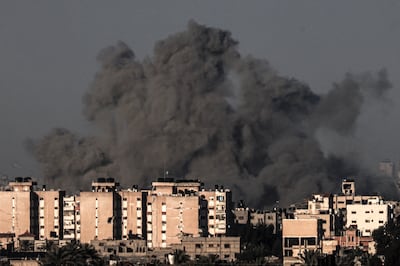 Smoke billows over Khan Younis in the southern Gaza Strip during the Israeli bombardment, on January 15. AFP