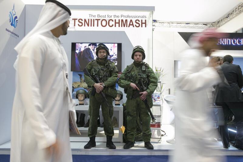 Men model uniforms by TsNIITochMash, a company on display at the Russian stand. Silvia Razgova / The National