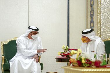 GHANTOOT, ABU DHABI, UNITED ARAB EMIRATES - November 18, 2020: HH Sheikh Mohamed bin Zayed Al Nahyan, Crown Prince of Abu Dhabi and Deputy Supreme Commander of the UAE Armed Forces (L), speaks with HRH Prince Salman Bin Hamad Bin Isa Al Khalifah Crown Prince and First Deputy Supreme Commander of Bahrain (R), during a tripartite summit between the UAE, Bahrain and Jordan. ( Rashed Al Mansoori / Ministry of Presidential Affairs ) ---