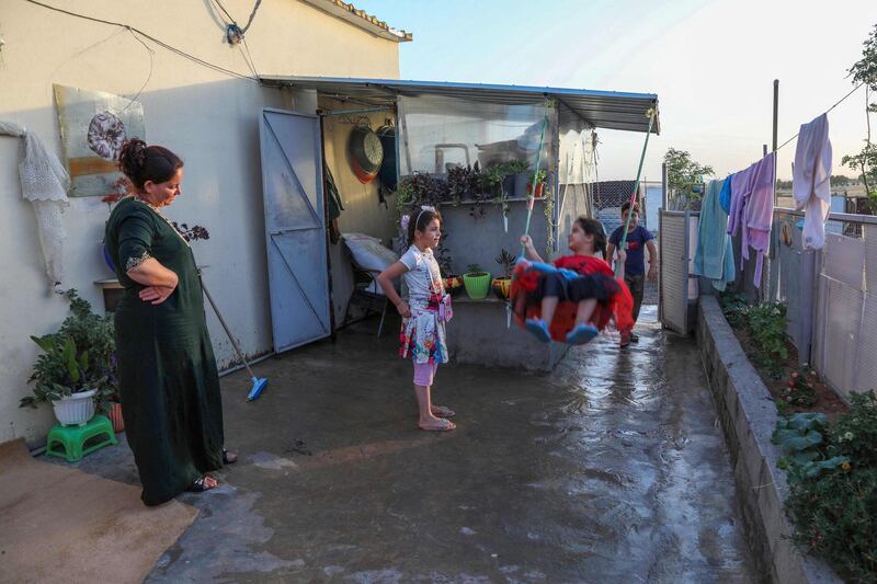 Children play in Bahrka refugee camp. Few residents believed the election, which was won by hardline cleric and head of Iran’s judiciary Ebrahim Raisi, would change their plight. AFP