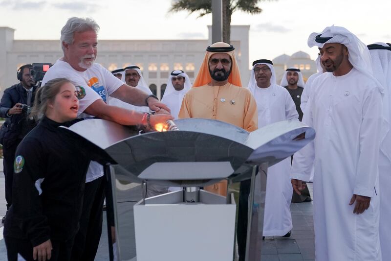 BU DHABI, UNITED ARAB EMIRATES - March 10, 2019: HH Sheikh Mohamed bin Zayed Al Nahyan, Crown Prince of Abu Dhabi and Deputy Supreme Commander of the UAE Armed Forces (R) and HH Sheikh Mohamed bin Rashid Al Maktoum, Vice-President, Prime Minister of the UAE, Ruler of Dubai and Minister of Defence (C), stand for a photograph with a participant holding the Special Olympics torch, during the Hope Retreat workshop, at the Presidential Palace.
( Eissa Al Hammadi for the Ministry of Presidential Affairs )
---