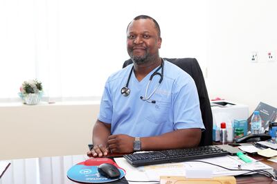 Dr Brian Mtemererwa in his clinic at the NMS Royal Hospital in Sharjah. Pawan Singh / The National