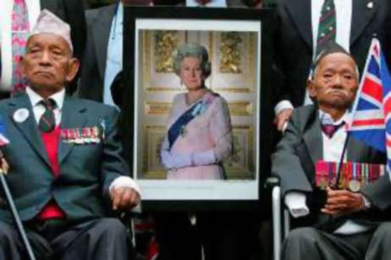 Tul Bahadur Pun, left, and Lachhiman Gurung, former Gurkha soldiers and Victoria Cross holders, outside the High Court in central London.