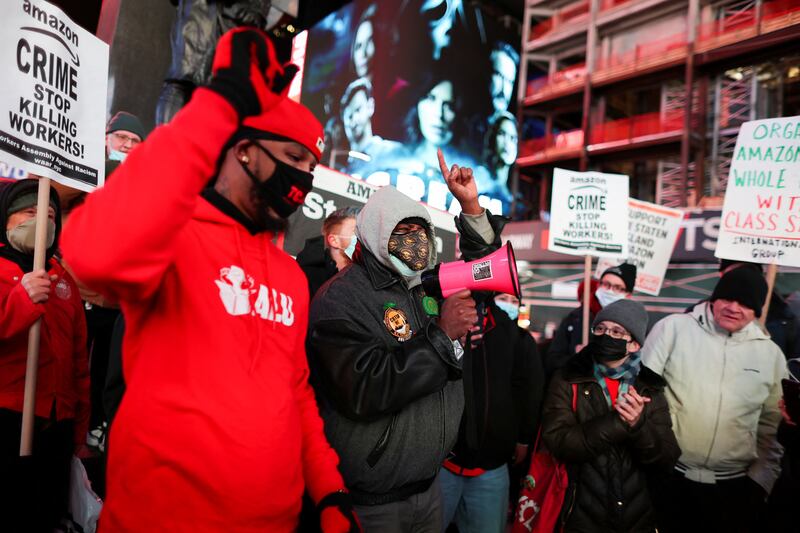 Staten Island Amazon workers protest in Times Square as they demand union rights in New York City. Reuters