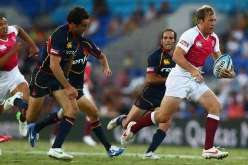 Rob Vickerman, right, and his England teammates hope to defend their Dubai Rugby Sevens title over the weekend. Mark Kolbe / Getty Images