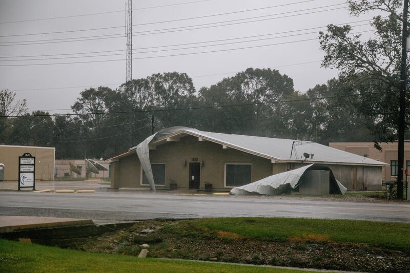 The roof of a business is damaged as Hurricane Delta makes landfall in Delcambre, Louisiana. Bloomberg