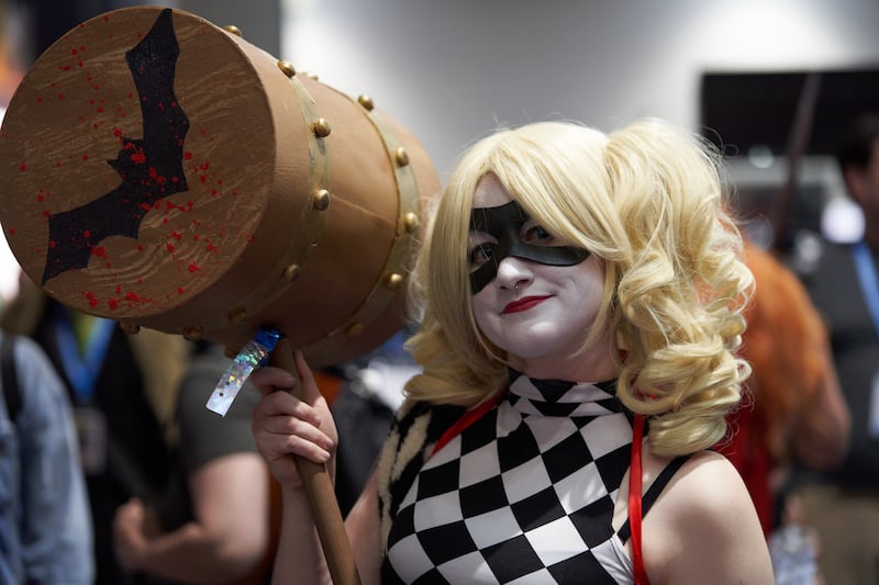 A woman cosplays as Harley Quinn.  EPA