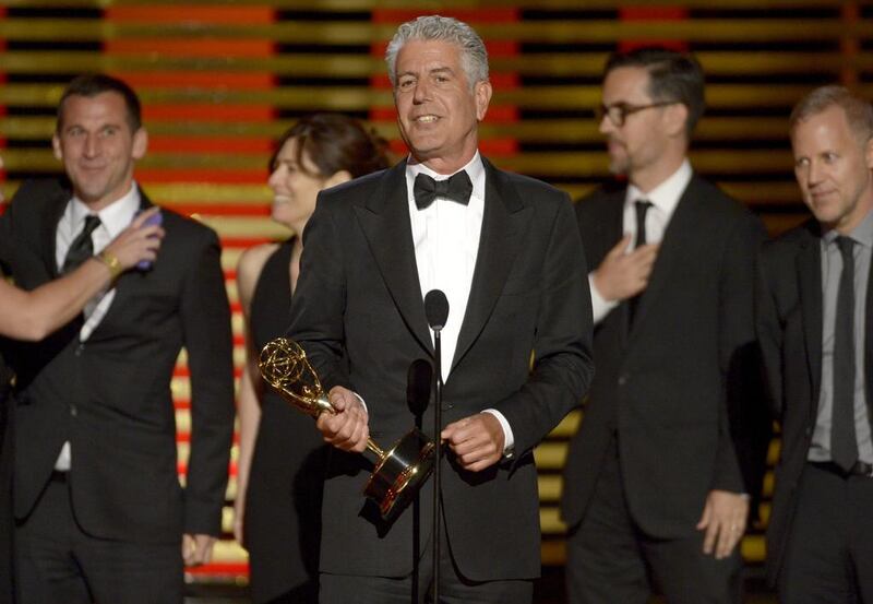 Anthony Bourdain and the team of Anthony Bourdain: Parts Unknown accept the award for outstanding informational series or special at the Television Academy’s Creative Arts Emmy Awards. Phil McCarten / Invision for the Television Academy / AP Images