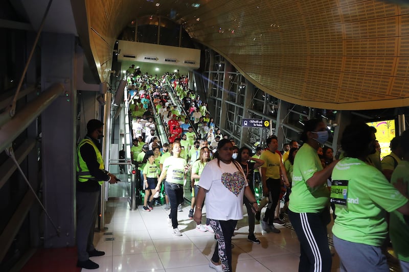 Participants exit Dubai Metro early in the morning while arriving for Dubai Run 2022