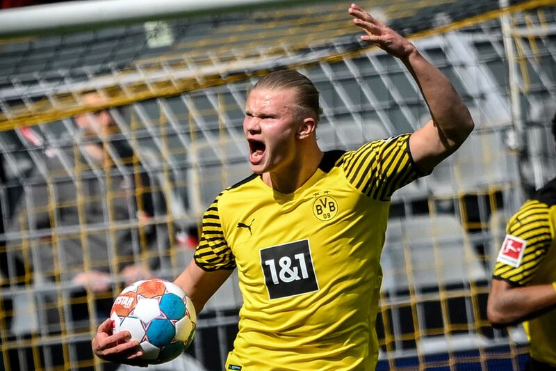 Dortmund's Erling Haaland celebrates scoring from the penalty spot in the Bundesliga match against VfL Bochum in April 2022. EPA