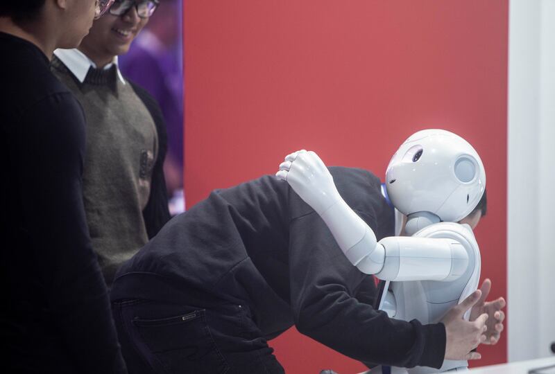 A hugging robot at day 4 of Gitex 2022. Leslie Pableo for The National