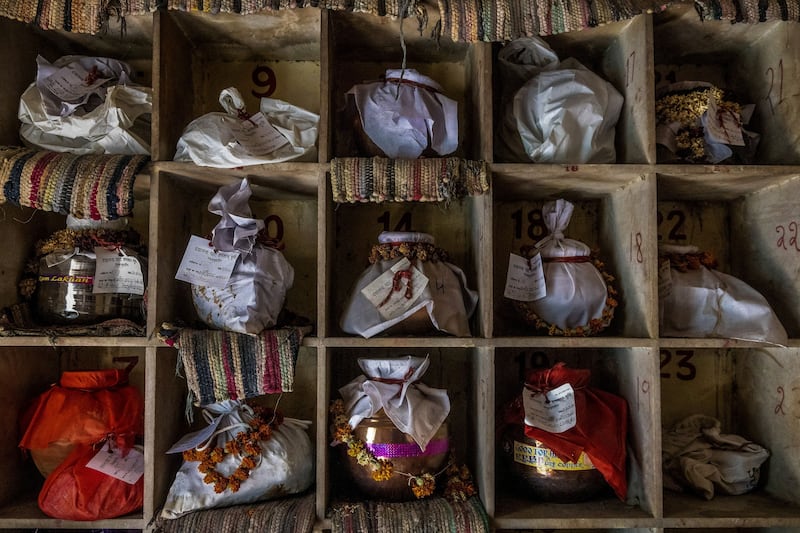 Siddiqui photographs urns containing ashes awaiting immersion at a crematorium in New Delhi on May 6, 2021. Reuters