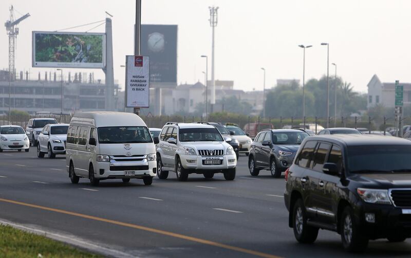 
DUBAI , UNITED ARAB EMIRATES – July 1 , 2015 : New camera radars installed to catch tailgaters on Sheikh Zayed Road in Dubai. Traffic on SZR in Dubai. ( Pawan Singh / The National ) For News. 
 *** Local Caption ***  PS0107- TAILGATING12.jpg