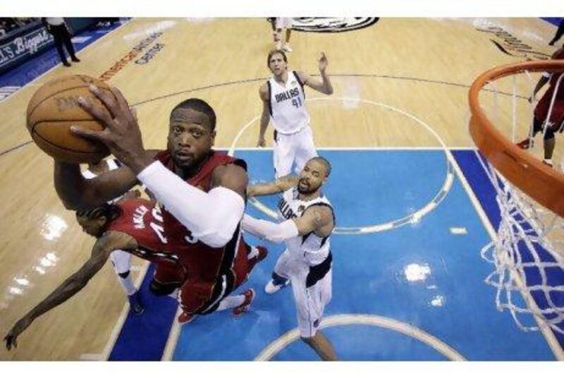 Miami Heat's Dwyane Wade goes up for a shot during the second half of Game 3.