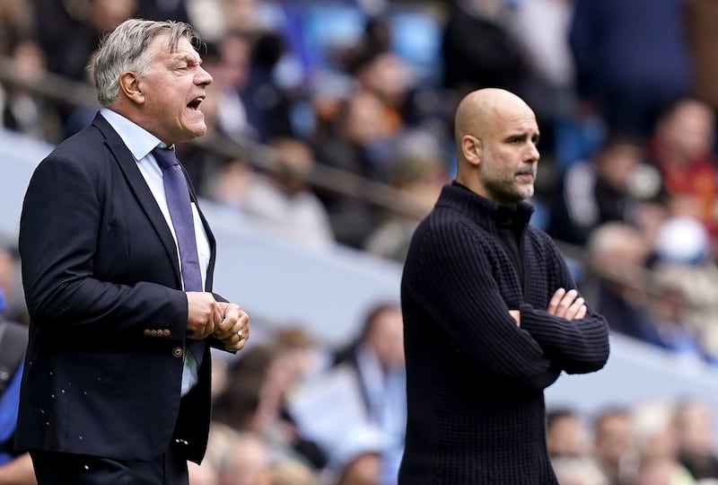 Manchester City manager Pep Guardiola and new Leeds manager Sam Allardyce on the touchline. EPA