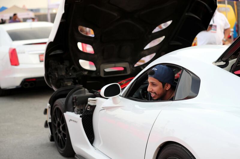 Dubai, United Arab Emirates - November 16, 2018: A visitor drives in his Dodge Viper at the annual Gulf Car Festival. Friday the 16th of November 2018 at Festival City Mall, Dubai. Chris Whiteoak / The National