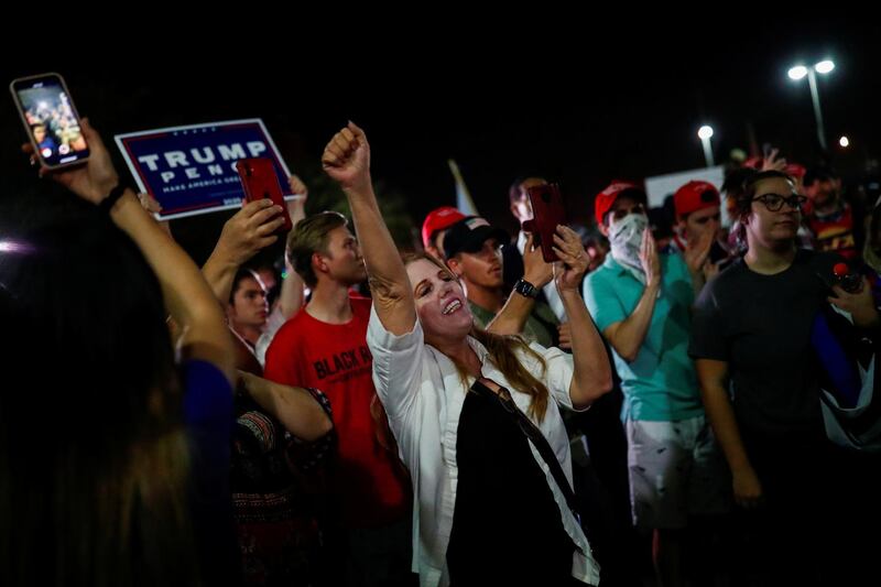 Supporters of US President Donald Trump gather in front of the Maricopa County Tabulation and Election Center to protest about the early results of the 2020 presidential election, in Phoenix, Arizona. Reuters