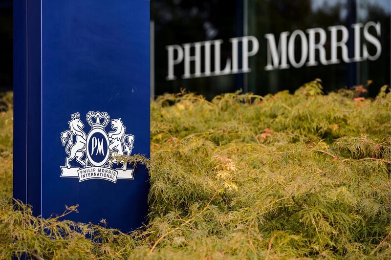 epa07797459 (FILE) - A company sign is seen outside the international headquarters of the US tobacco company Philip Morris, in Lausanne, Switzerland, 30 September 2013 (reissued 27 August 2019). Reports on 27 August 2019 state Altria Group Inc and Philip Morris International Inc are engaged in merger talks. If succesfull, the merger would bring back together two companies that were separated in 2008 when Altria spun off Philip Morris International Inc.  EPA/LAURENT GILLIERON *** Local Caption *** 51021060
