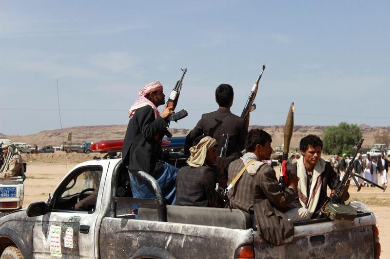 Houthi rebels patrol an area in their stronghold of Saada in northern Yemen on August 2, 2016. Naif Rahma / Reuters