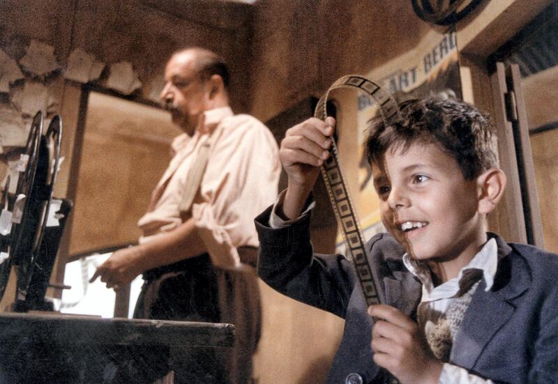 No Merchandising. Editorial Use Only. No Book Cover Usage.
Mandatory Credit: Photo by Cristaldifilm/Films Ariane/Kobal/REX/Shutterstock (5881574h)
Philippe Noiret, Salvatore Cascio
Cinema Paradiso - 1989
Director: Giuseppe Tornatore
Cristaldifilm/Films Ariane
FRANCE/ITALY
Scene Still
Foreign
Nuovo Cinema Paradiso