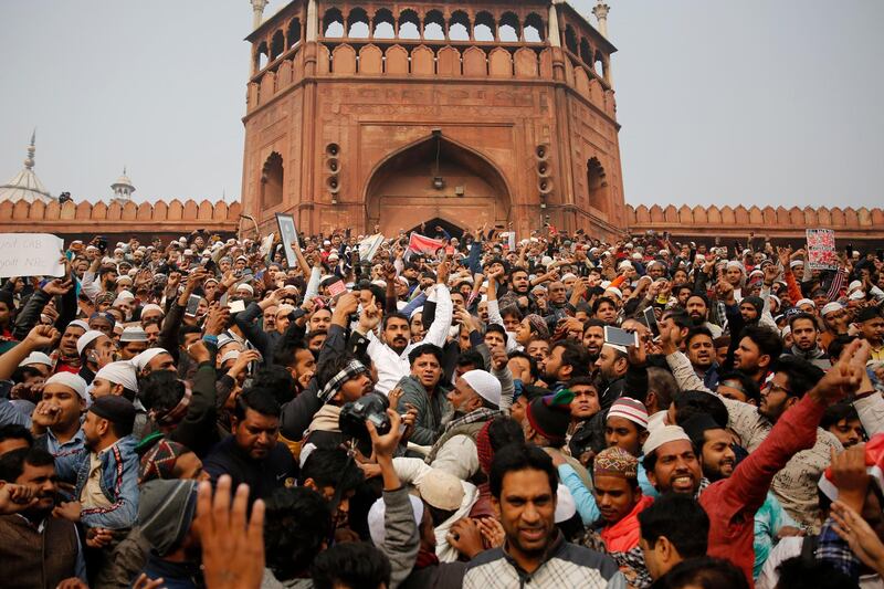 Dalit leader and Bhim Army founder Chandrashekhar Azad, center in white, join others for a protest against the Citizenship Amendment Act after Friday prayers outside Jama Masjid in New Delhi, India, Friday, December 20, 2019. PAP Photo/Altaf Qadri