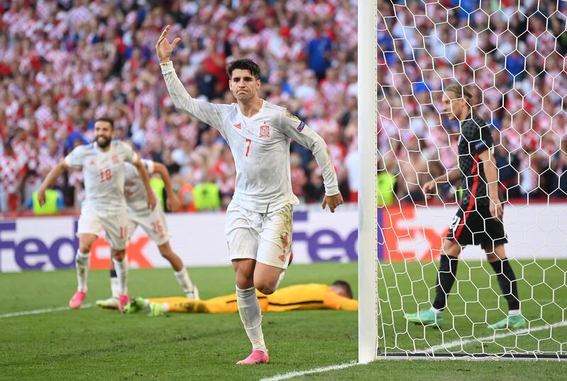 Alvaro Morata celebrates after scoring for Spain.