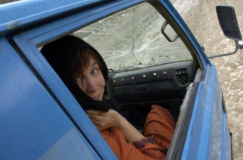 US journalist Kim Barker stranded on the Bloody mountain pass, near Khost, Afghanistan, in 2005. Courtesy Kuni Takahashi