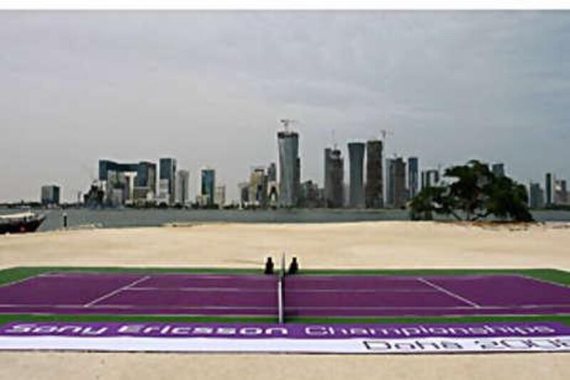 The tennis court, on a desert island in the bay of Doha.