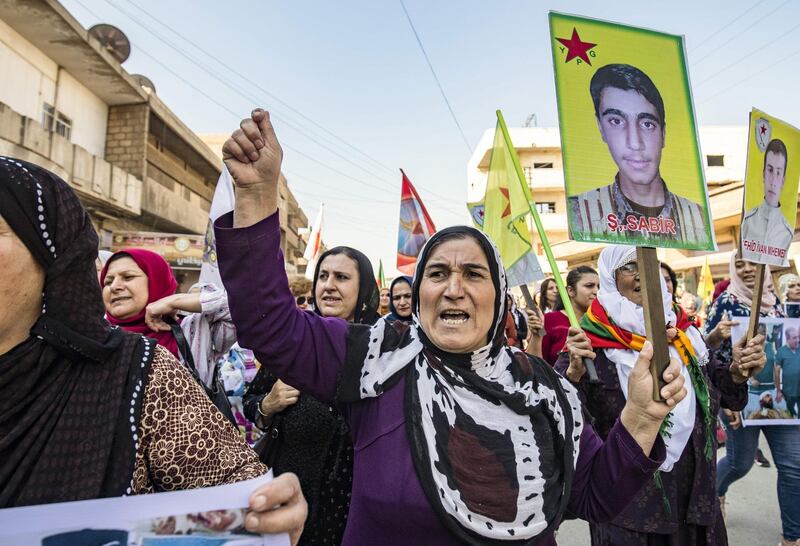 Syrian Kurds demonstrate against the Turkish assault against northeastern Syria, in the   town of Qamishli. AFP